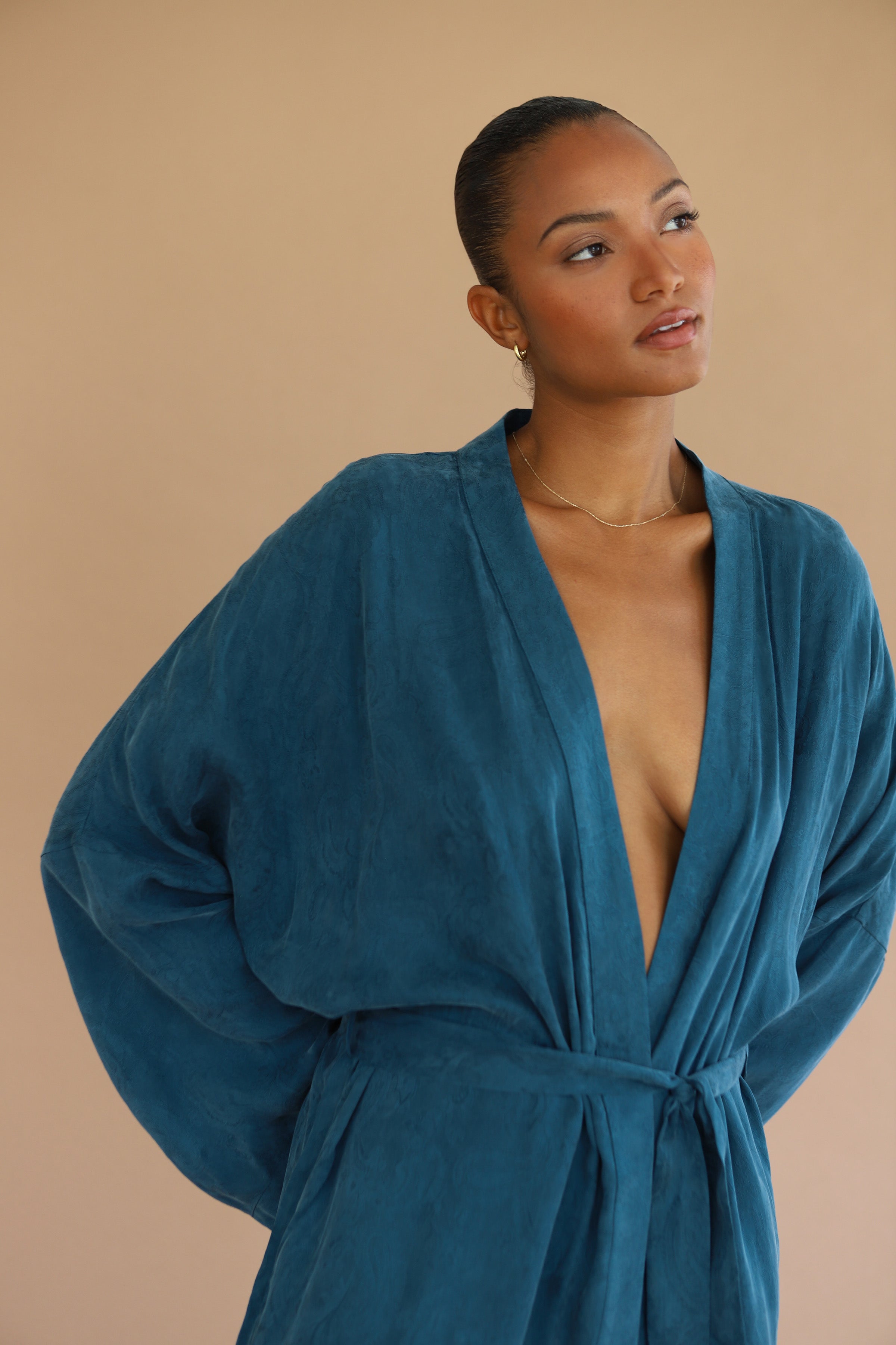 dress robe 22 Momme Mid Length Silk Navy Blue S a period when fashion embraced softer silhouettes and classical influences 8 Best Robes of 2026